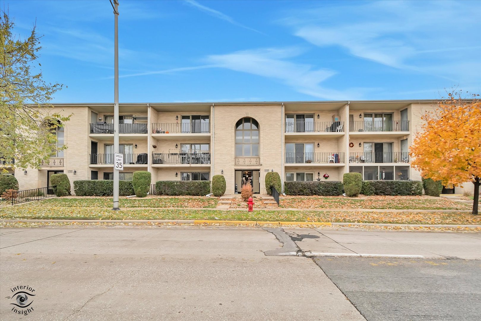 10538 Central Avenue, Unit 1S Chicago Ridge, IL 60415 - Photo 1 of 25 a front view of a building with a garden