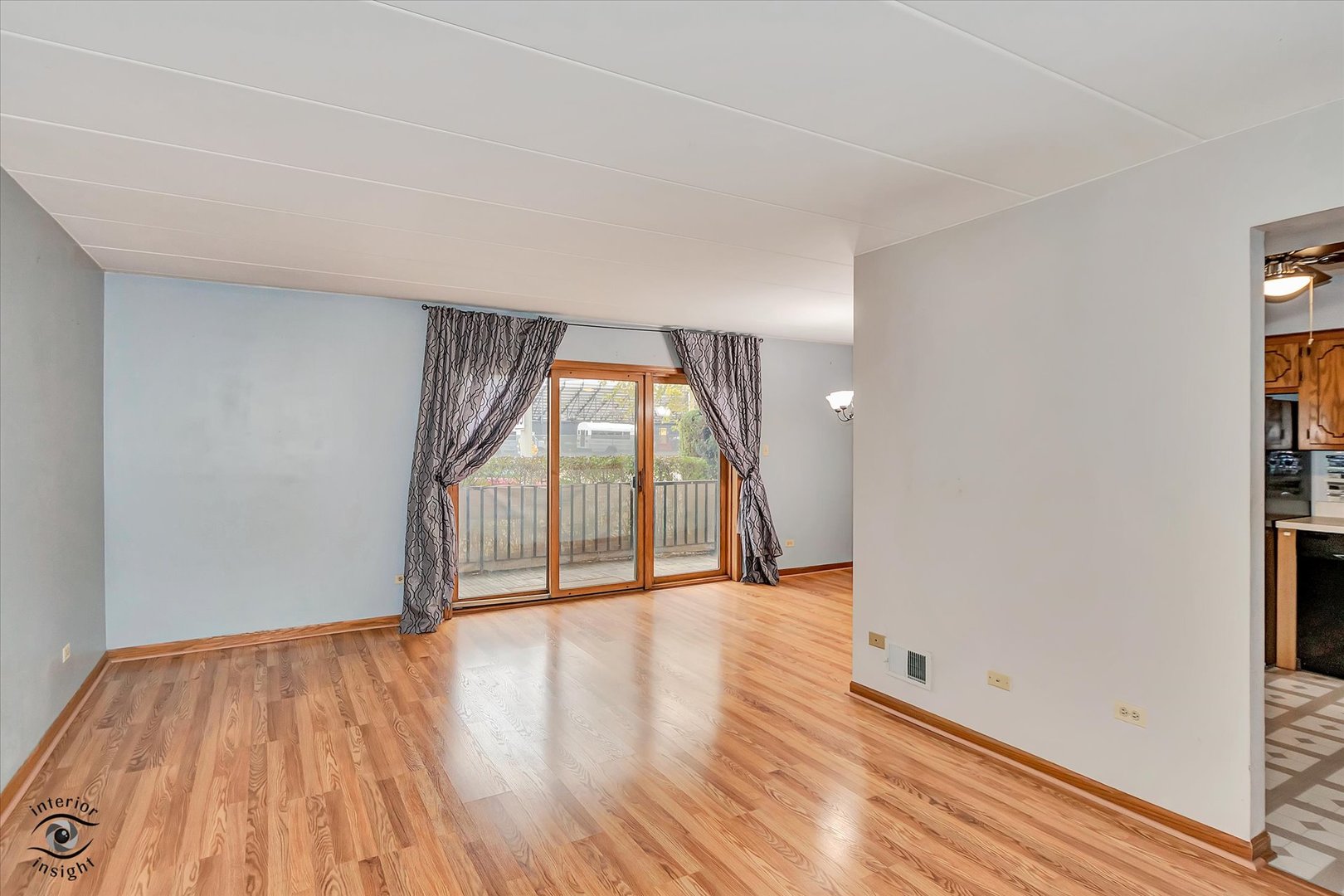 10538 Central Avenue, Unit 1S Chicago Ridge, IL 60415 - Photo 2 of 25 wooden floor in an empty room with a window