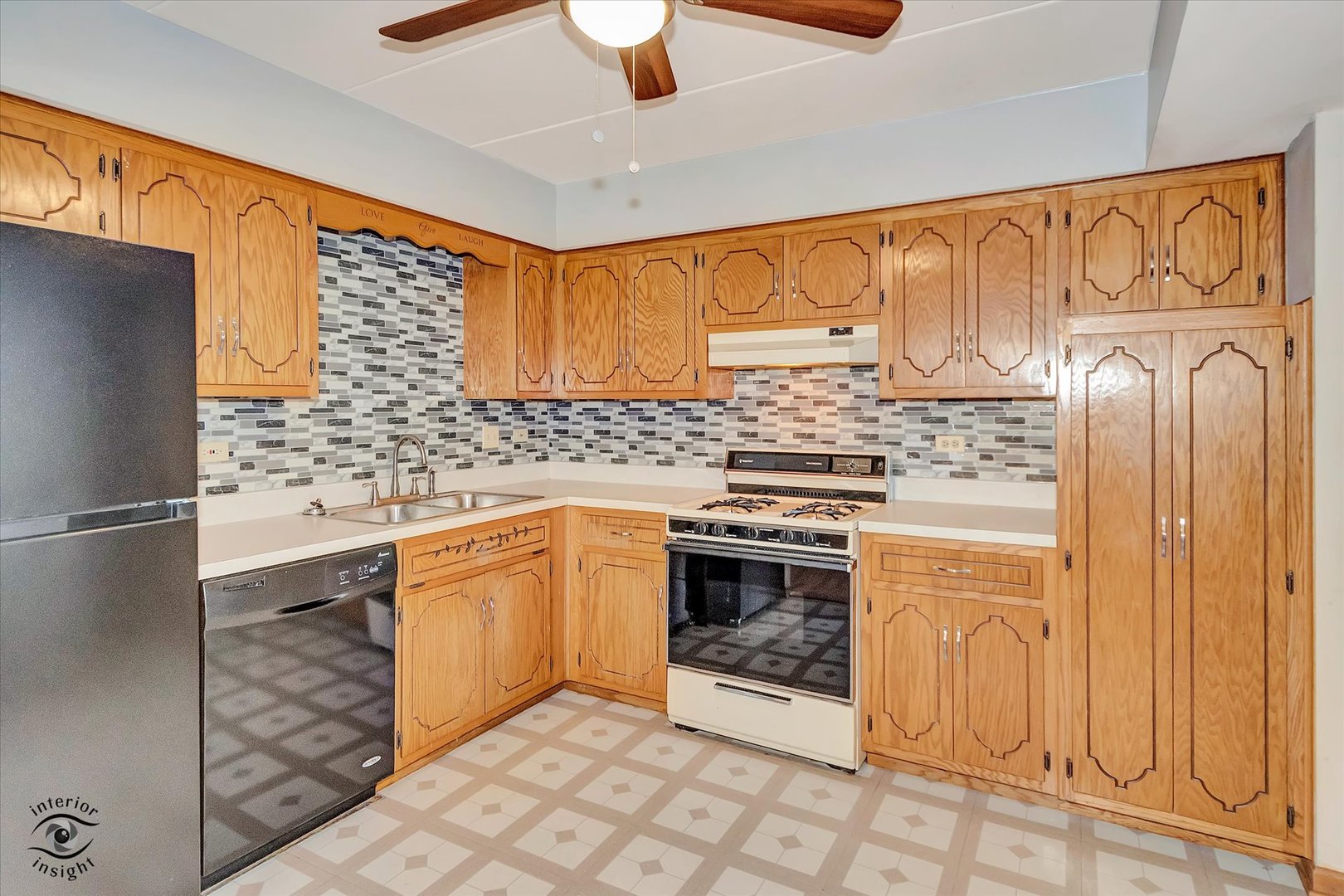 10538 Central Avenue, Unit 1S Chicago Ridge, IL 60415 - Photo 7 of 25 a kitchen with stainless steel appliances granite countertop a stove a sink and a refrigerator