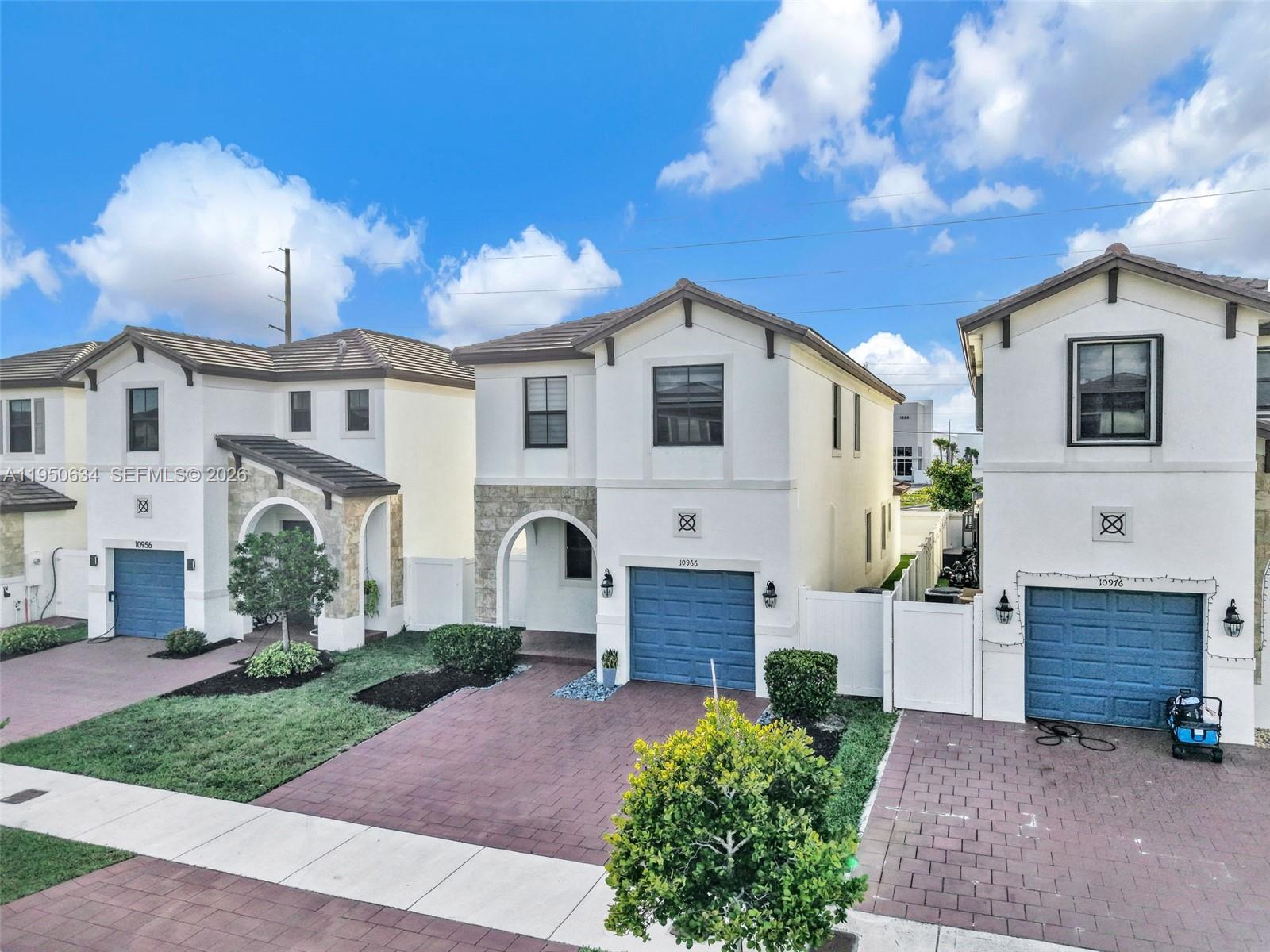 10966 West 35th Way Hialeah, FL 33018 - Photo 47 of 48 a front view of a house with garden