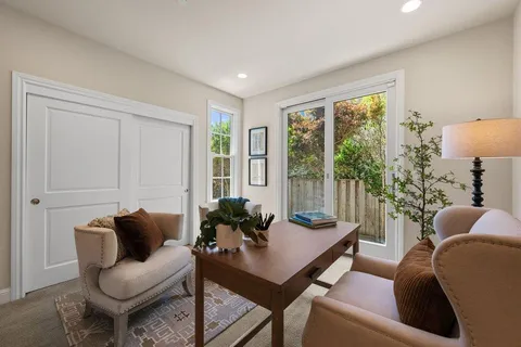 a kitchen with a sink cabinets and appliances