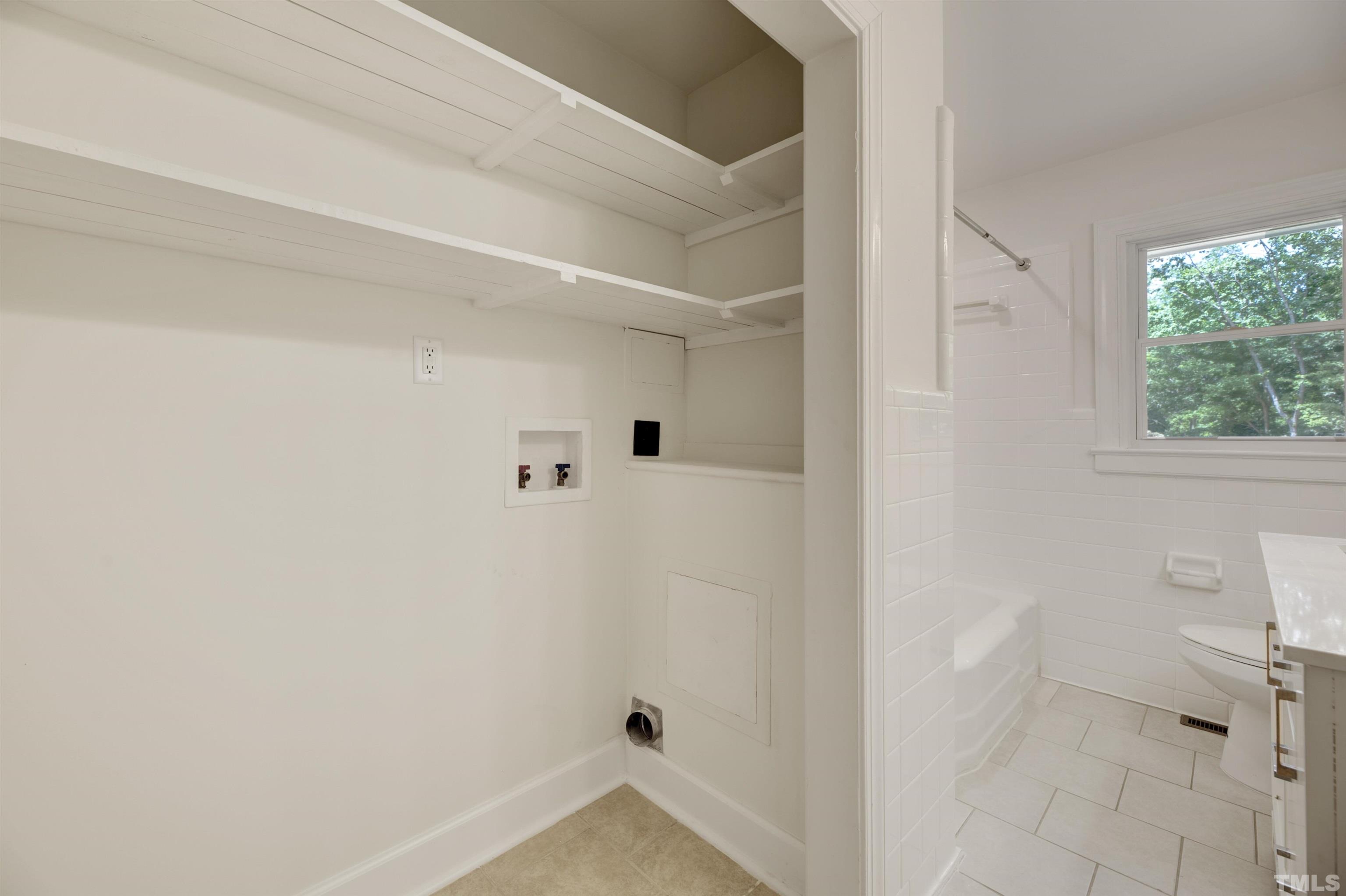 218 Hocutt Road Durham, NC 27703 - Photo 30 of 43 a view of a hallway with closet