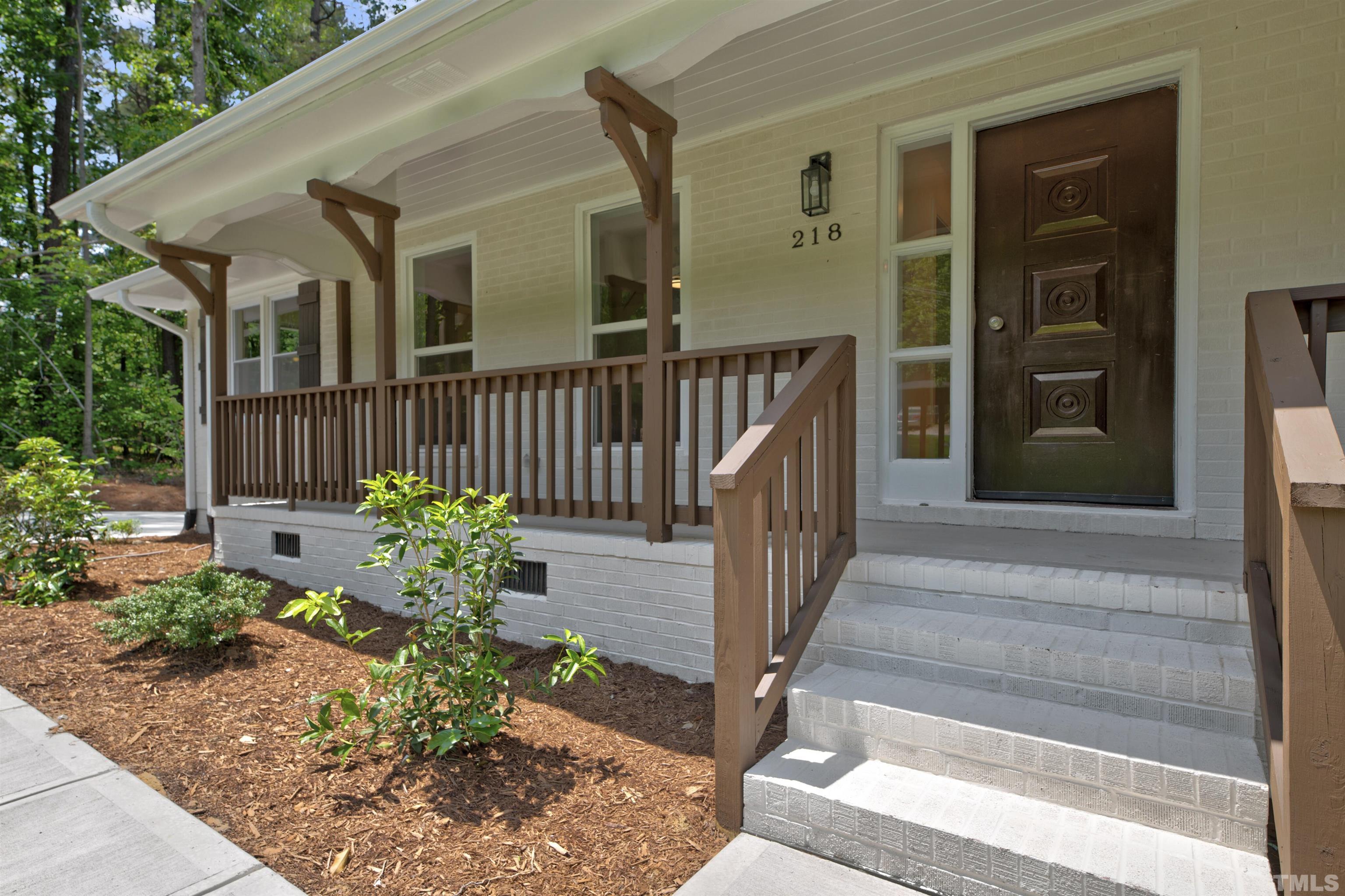 218 Hocutt Road Durham, NC 27703 - Photo 4 of 43 a front view of a house