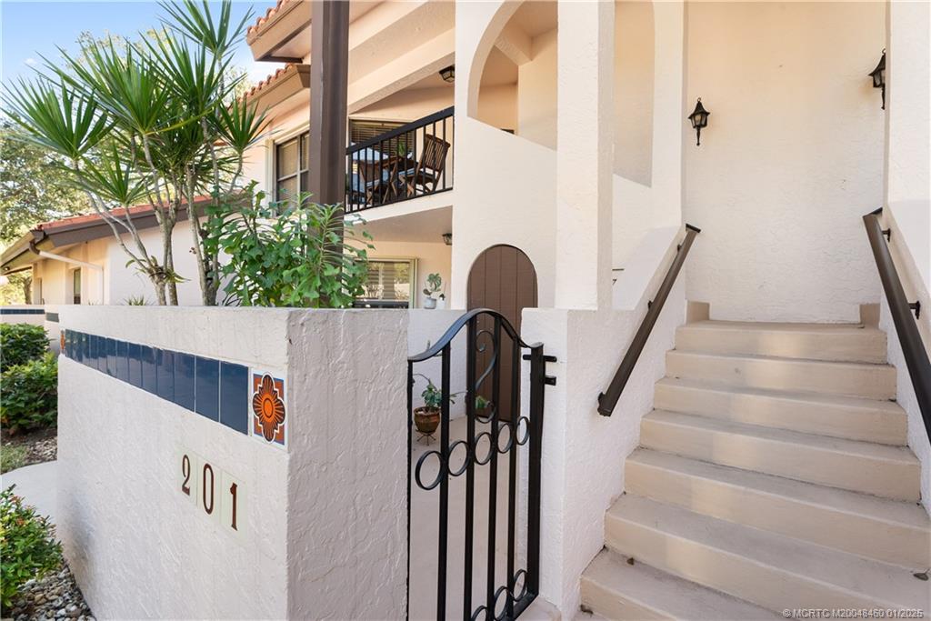 6130 Southeast Martinique Drive, Unit 201 Stuart, FL 34997 - Photo 7 of 36 a view of entryway