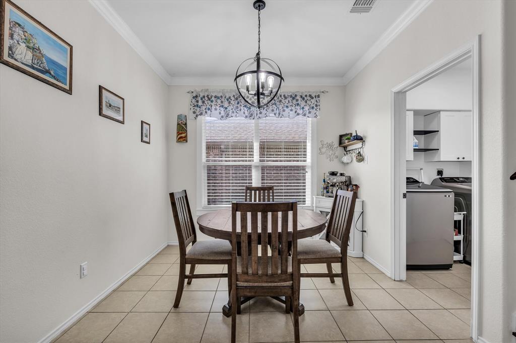 9453 Centennial Drive Waco, TX 76708 - Photo 22 of 37 a view of a dining room with furniture window and outside view