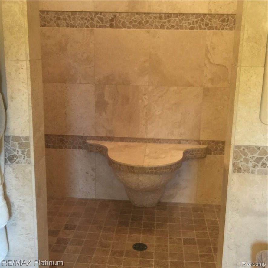 11661 Roberts Road Stockbridge, MI 49285 - Photo 48 of 53 Master Bath Natural Stone Tile Shower and Tile Bath updated 5/2016 $15k