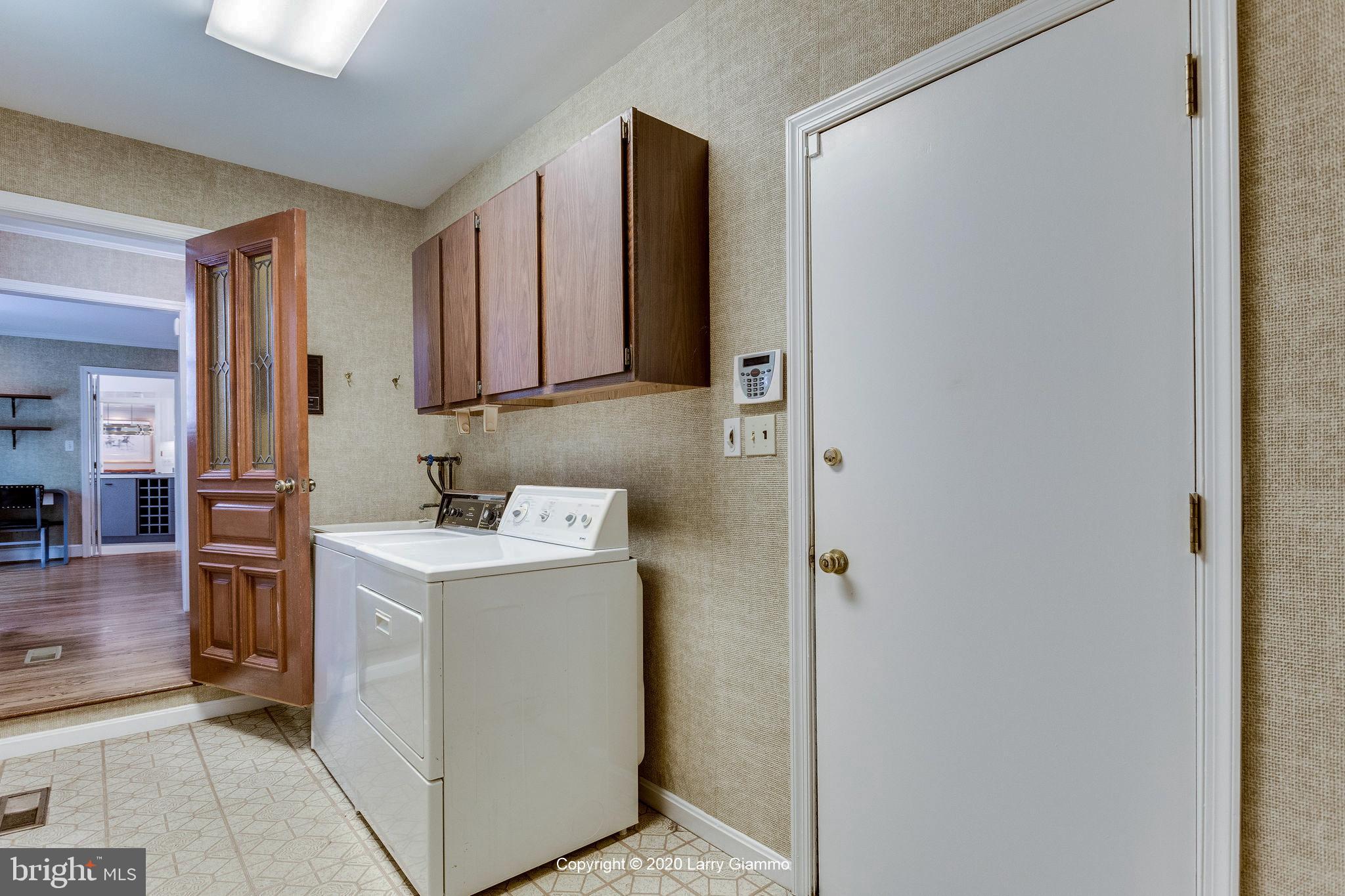13720 Bridgewater Drive Silver Spring, MD 20904 - Photo 18 of 42 Laundry room, connecting family room and garage