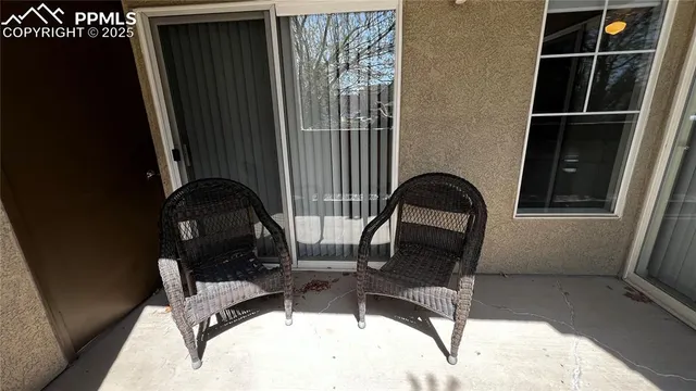 a picture of table and chair with wooden floor