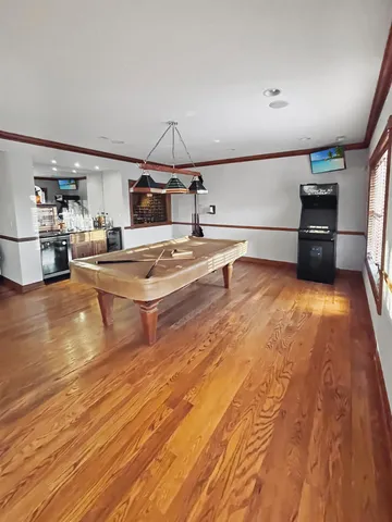 a bathroom with a sink and shower