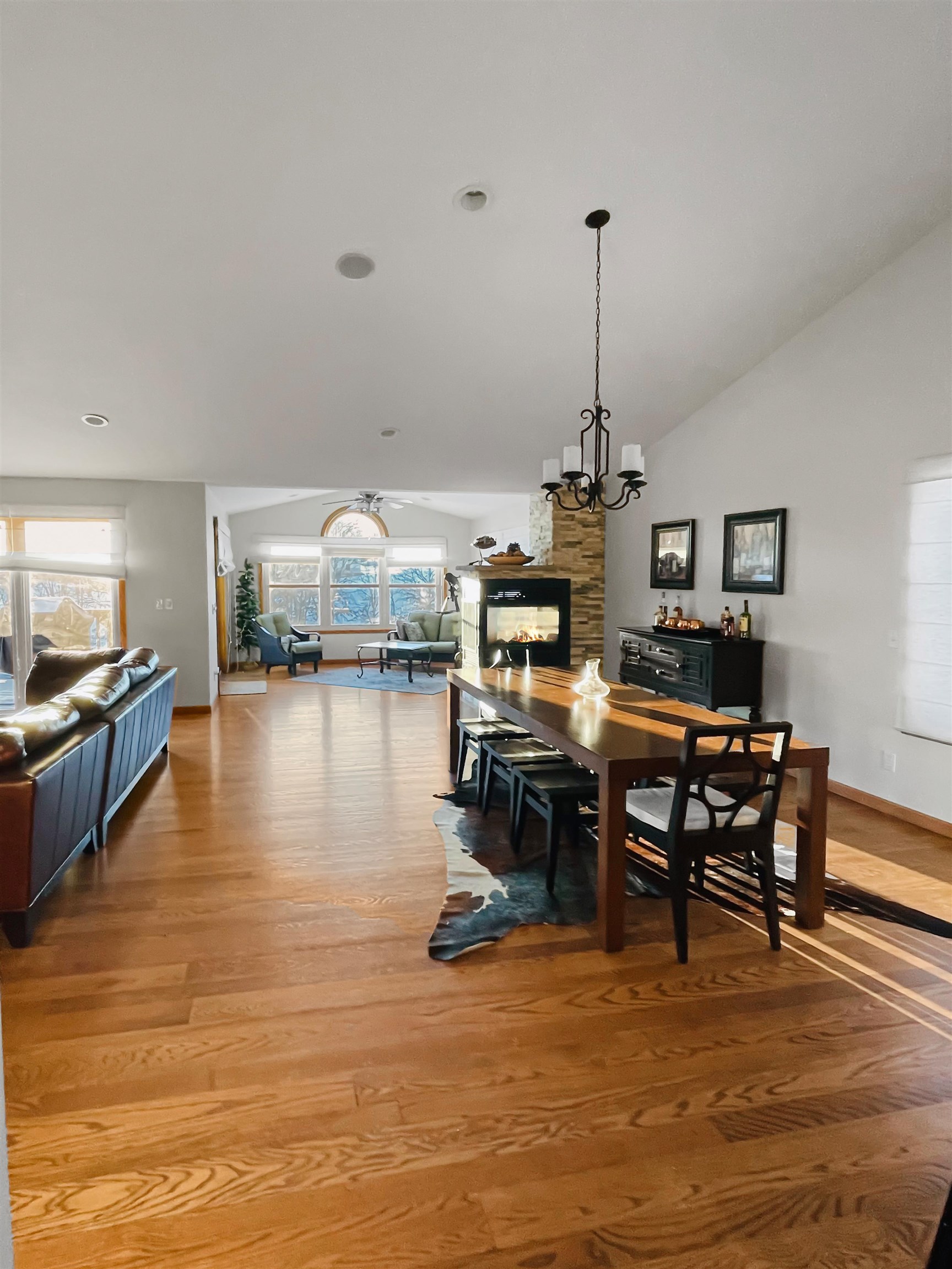27-54 Ridgeview Drive Lake Carroll, IL 61046 - Photo 32 of 58 a dining room with furniture a chandelier and wooden floor