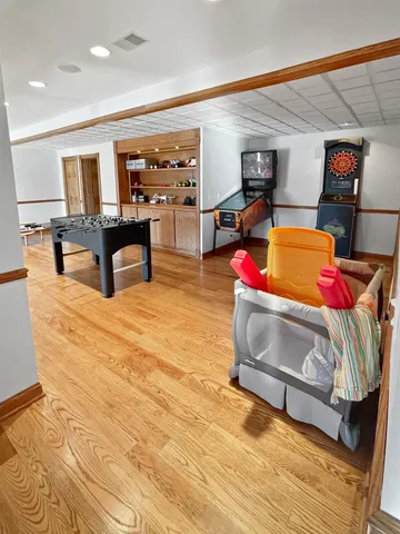 a kitchen with stainless steel appliances granite countertop a sink and a stove top oven