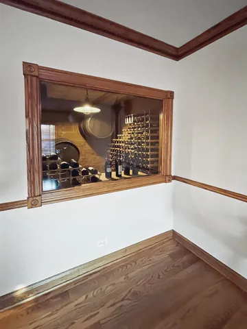 a view of deck with a large tree and wooden floor