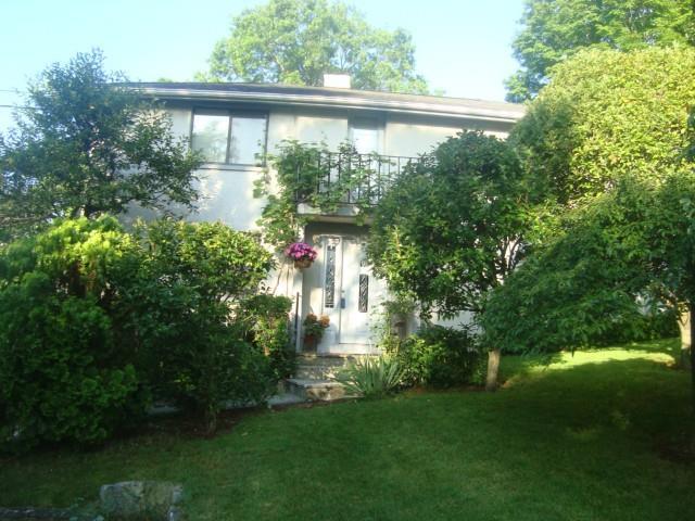 478 Long Ridge Road Stamford, CT 06902 - Photo 1 of 1 a view of a house with brick walls and a small yard