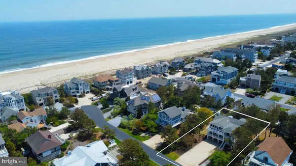 an aerial view of a ocean and beach