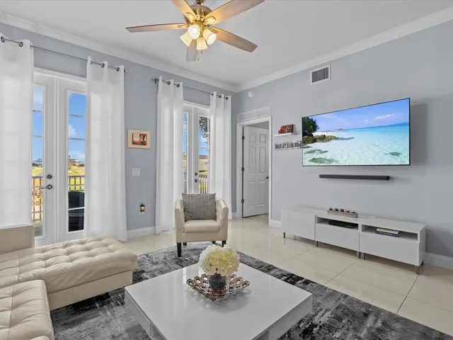 a kitchen with sink and refrigerator