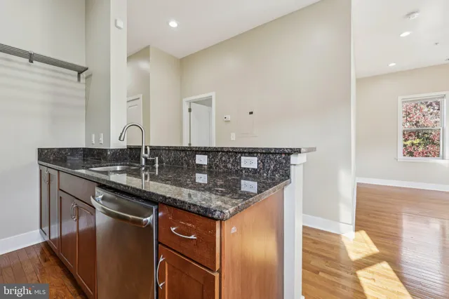 a sink sitting next to a bathroom sink