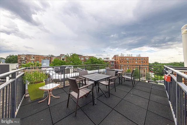 a view of a terrace with furniture