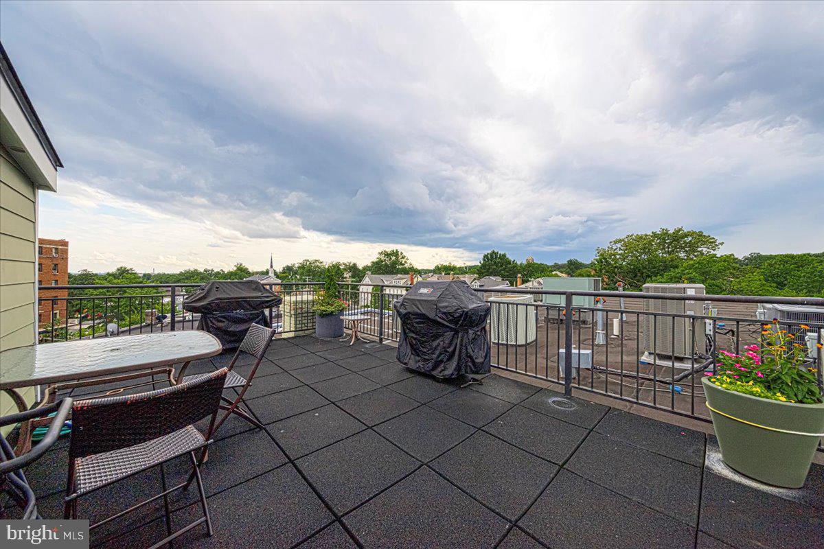 1352 Longfellow Street Northwest, Unit 302 Washington, DC 20011 - Photo 21 of 24 a view of a chairs and table in the terrace