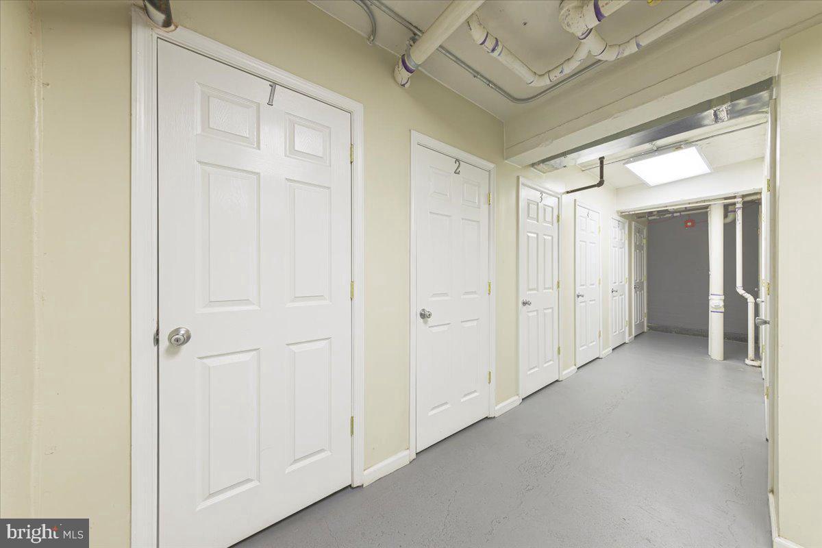 1352 Longfellow Street Northwest, Unit 302 Washington, DC 20011 - Photo 22 of 24 a view of a hallway to rooms
