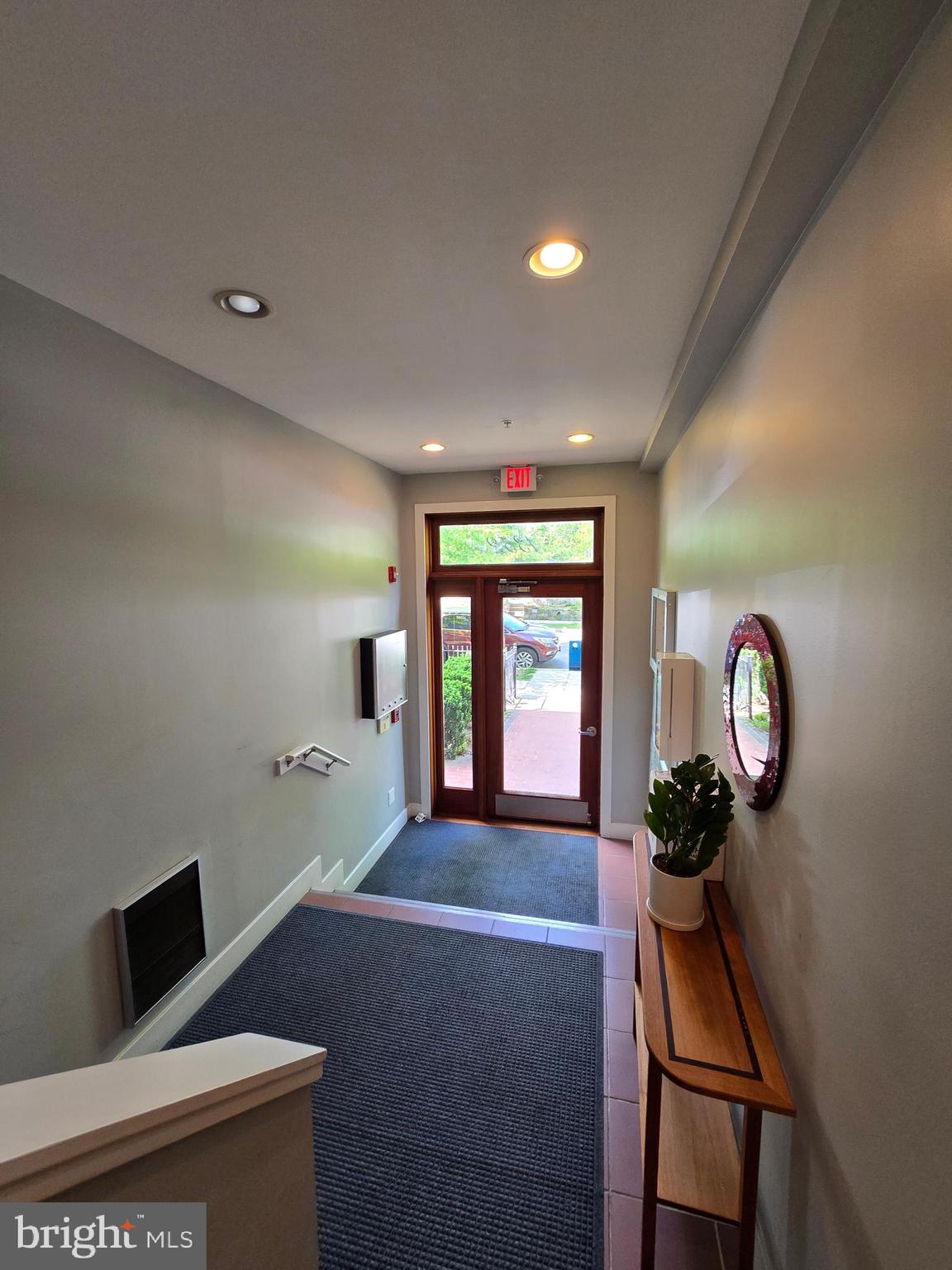 1352 Longfellow Street Northwest, Unit 302 Washington, DC 20011 - Photo 3 of 24 a living room with furniture and a window