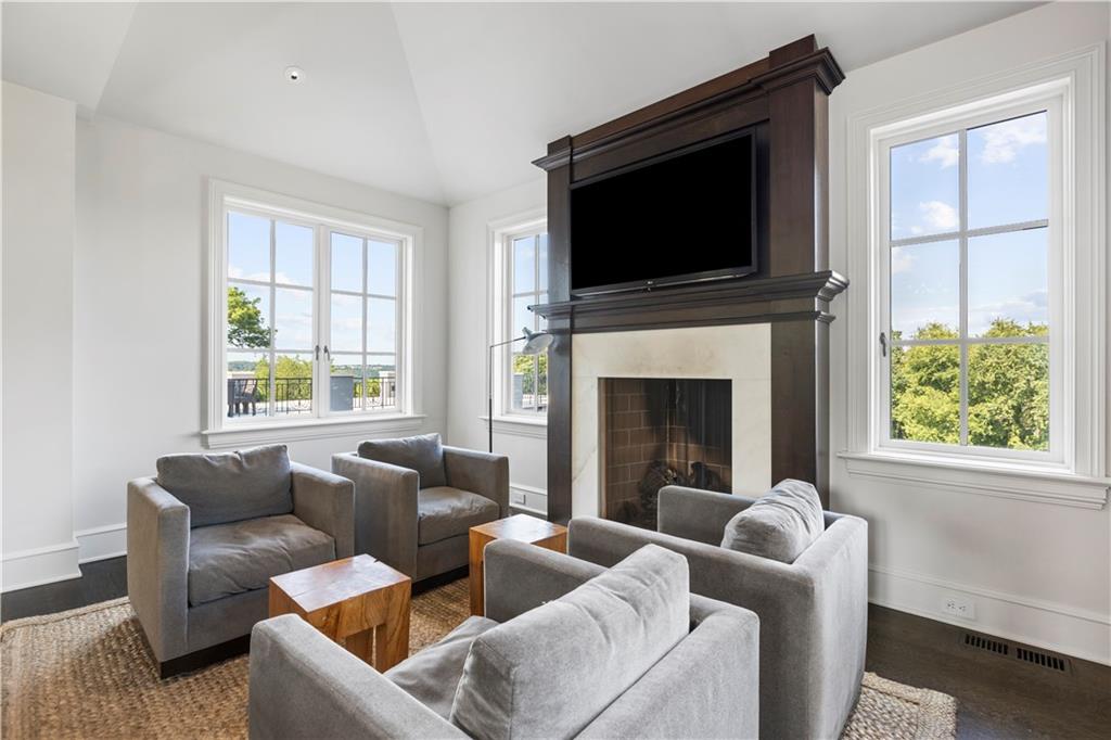 755 Chestnut Road Sewickley, PA 15143 - Photo 15 of 25 Located in the Kitchen, this cozy nook is centered on a gas fireplace and custom built-ins.