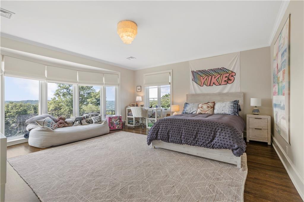 755 Chestnut Road Sewickley, PA 15143 - Photo 21 of 25 a bedroom with a bed and a large window