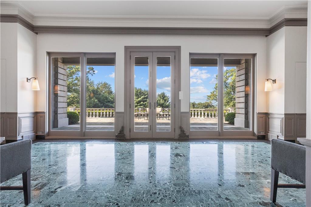755 Chestnut Road Sewickley, PA 15143 - Photo 4 of 25 a view of empty room with floor to ceiling windows