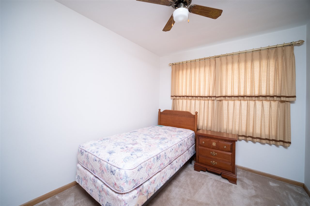4228 Pinecrest Road Rockford, IL 61107 - Photo 20 of 30 a bedroom with a bed and a window
