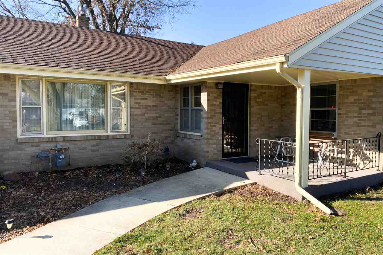 4228 Pinecrest Road Rockford, IL 61107 - Photo 2 of 30 a front view of a house with a yard