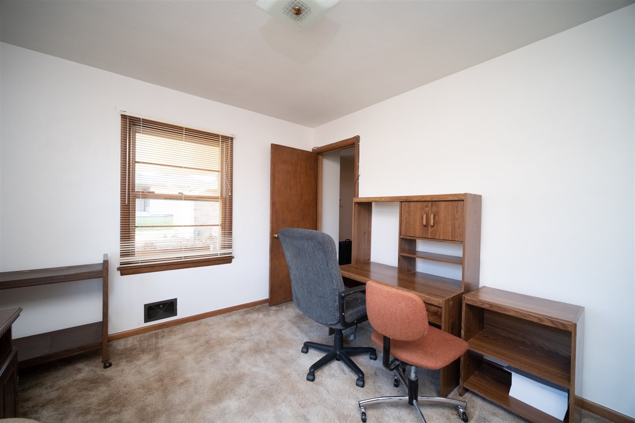 4228 Pinecrest Road Rockford, IL 61107 - Photo 24 of 30 a workspace with furniture and a window