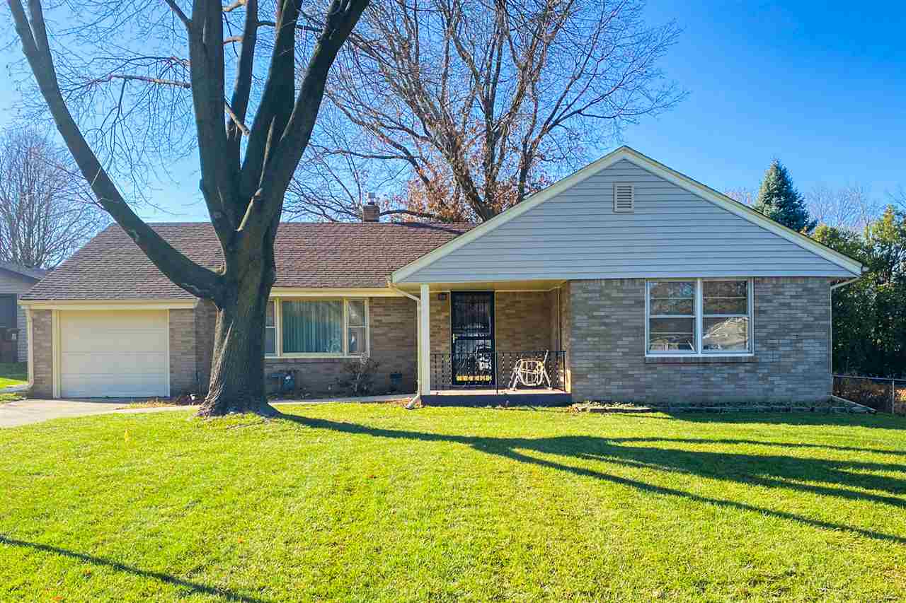 4228 Pinecrest Road Rockford, IL 61107 - Photo 4 of 30 a view of a house with a swimming pool