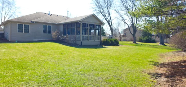 a view of a backyard with a garden