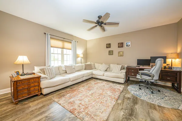 a large kitchen with kitchen island granite countertop a sink counter space and appliances