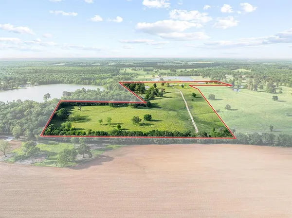 a view of lake with green space