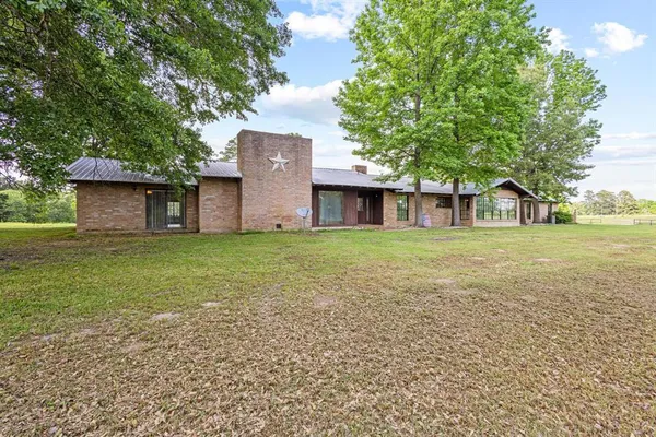 a house view with a outdoor space
