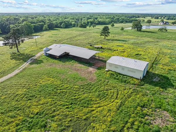 a view of a backyard of the house