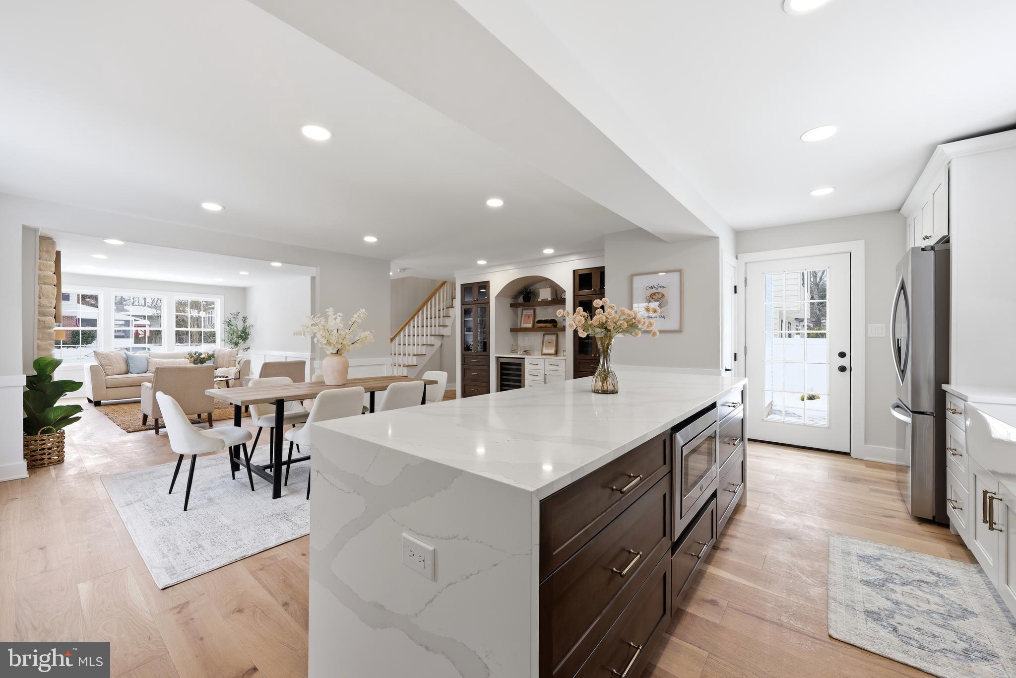 615 Pardee Lane Haddonfield, NJ 08033 - Photo 17 of 37 a large kitchen with a table and chairs