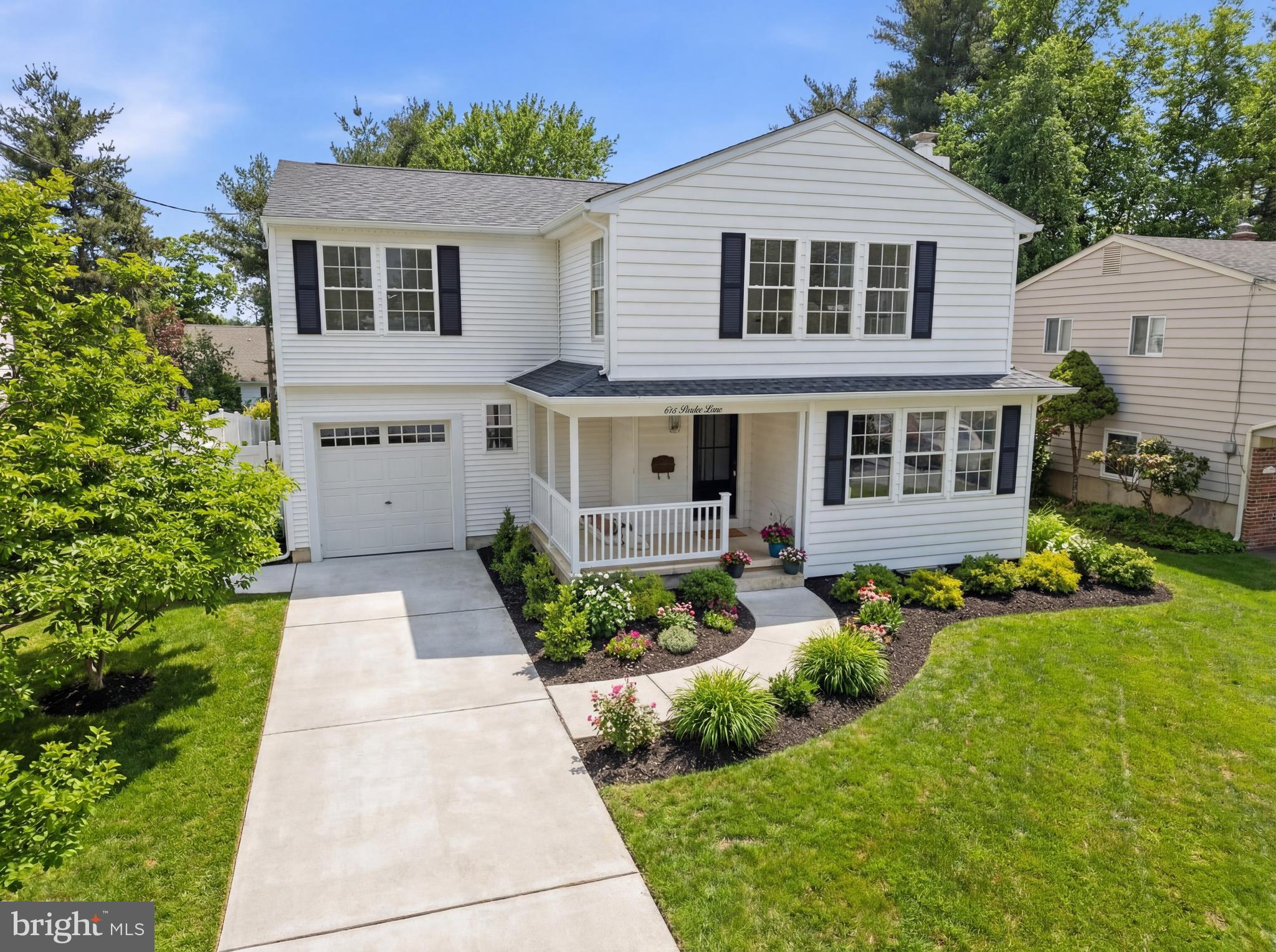 615 Pardee Lane Haddonfield, NJ 08033 - Photo 2 of 37 a front view of a house with a yard
