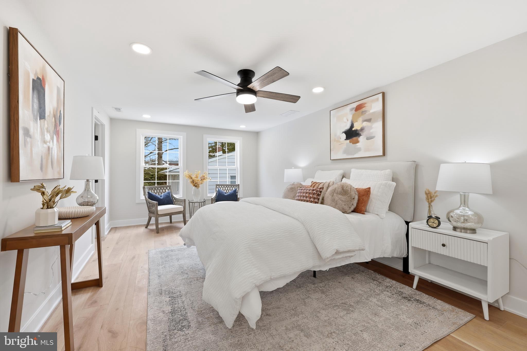 615 Pardee Lane Haddonfield, NJ 08033 - Photo 23 of 37 a bedroom with a bed and a chandelier
