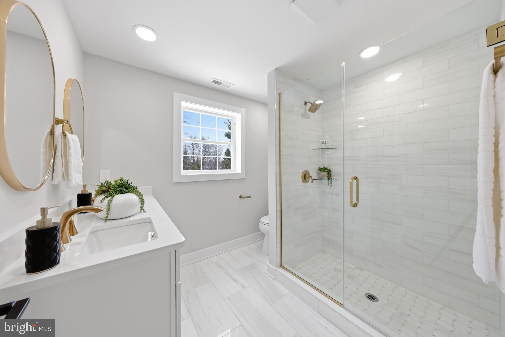 615 Pardee Lane Haddonfield, NJ 08033 - Photo 26 of 37 a bathroom with a sink mirror and shower