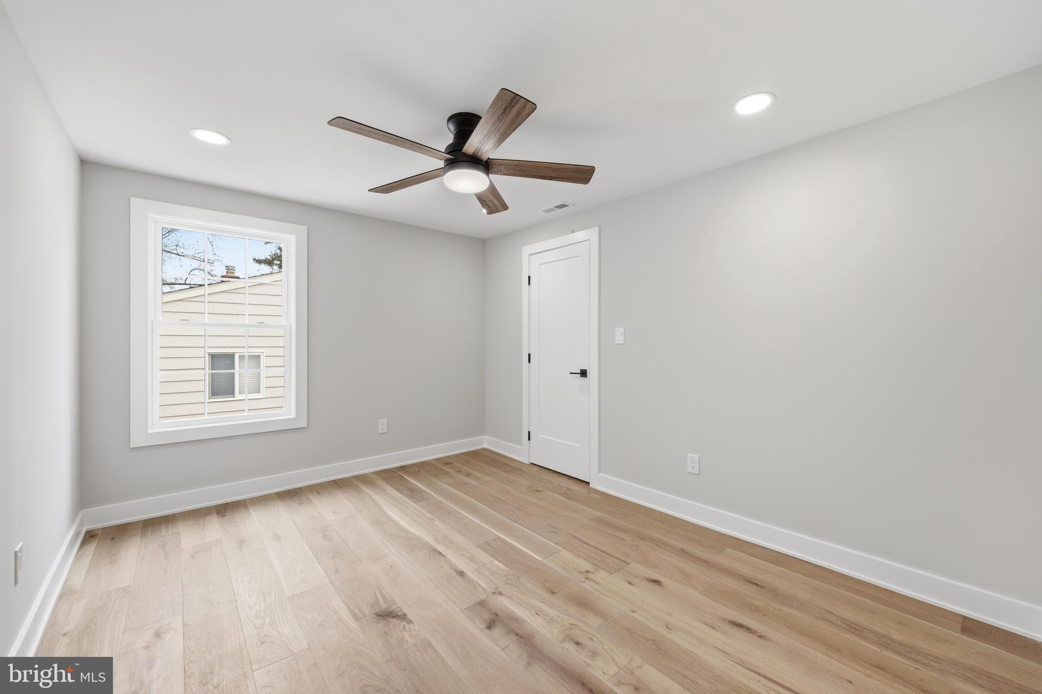 615 Pardee Lane Haddonfield, NJ 08033 - Photo 29 of 37 a view of empty room with wooden floor and fan