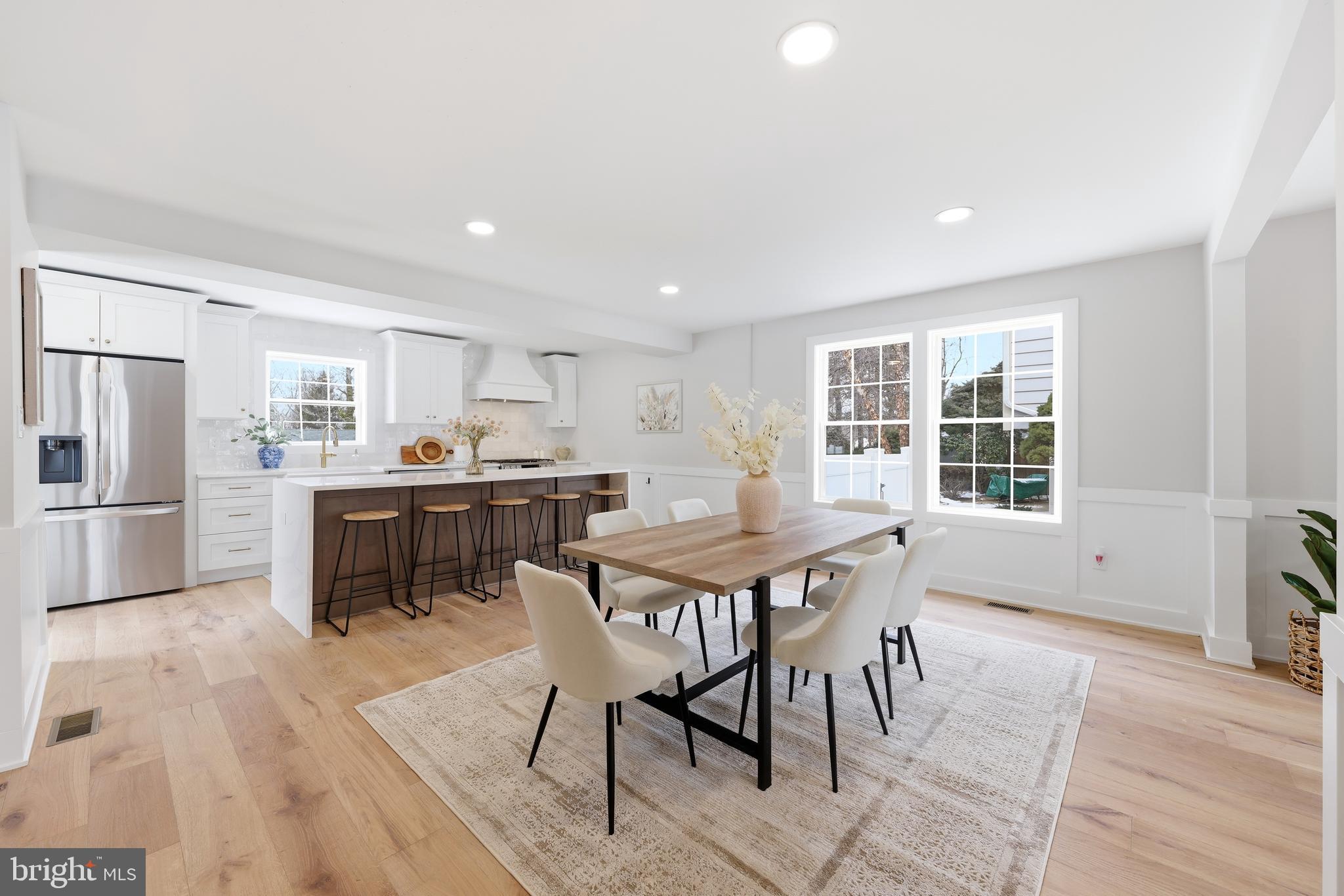 615 Pardee Lane Haddonfield, NJ 08033 - Photo 10 of 37 a dining room with a table chairs and kitchen view