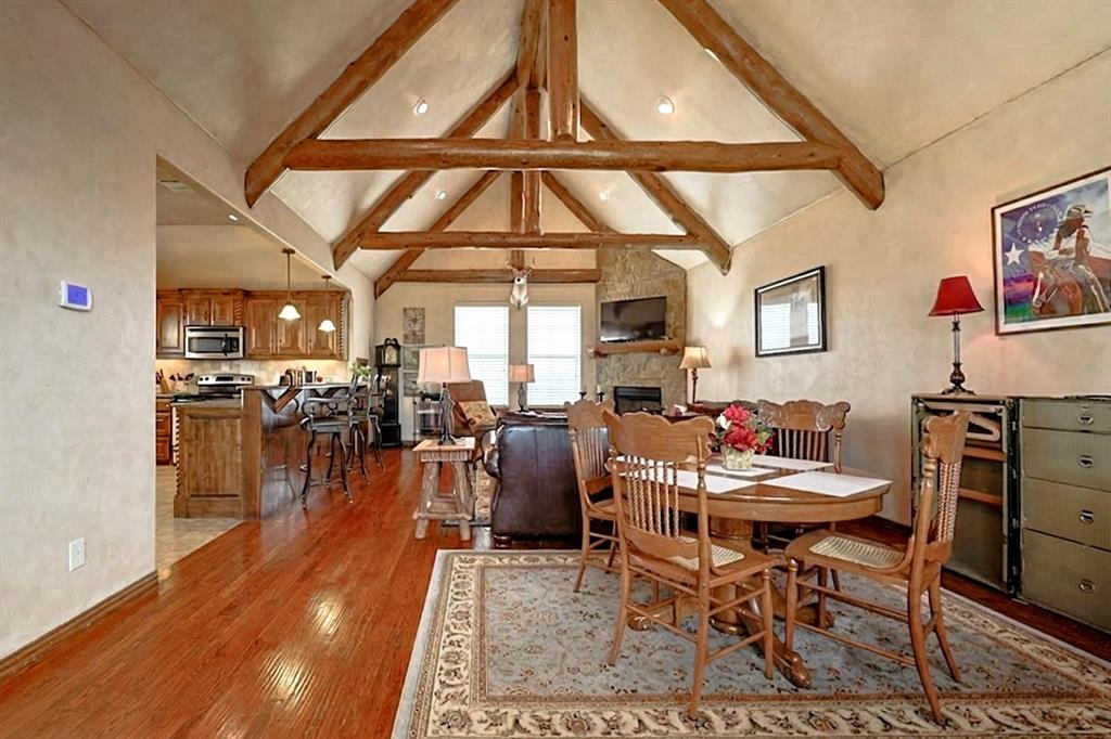 222 Bayne Road Haslet, TX 76052 - Photo 29 of 40 Full guest home or mother in law suite, with full kitchen, fireplace, living room, dining room and bathroom