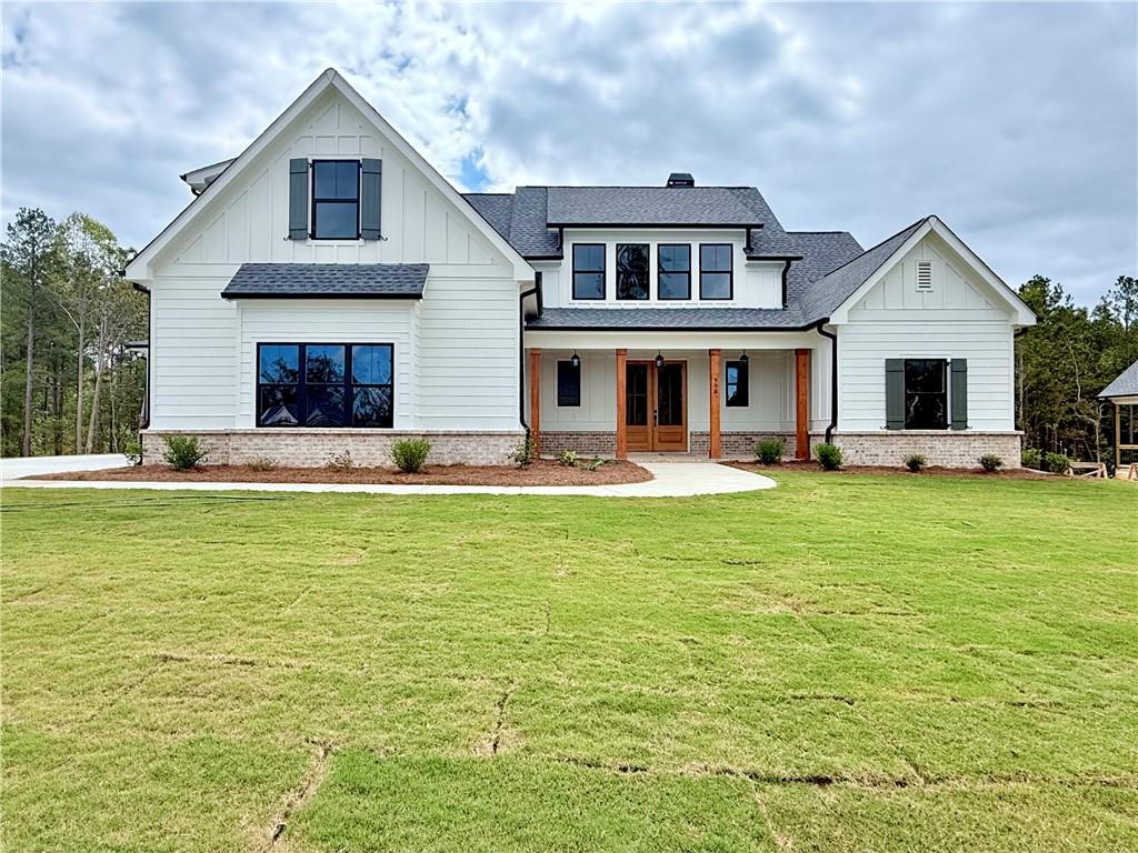 141 Palisade Drive Rydal, GA 30171 - Photo 2 of 50 a front view of a house with garden
