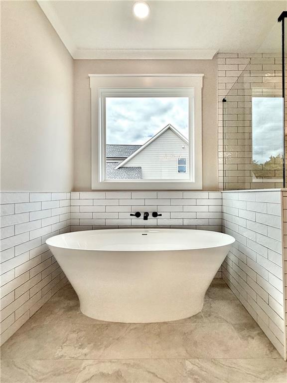 141 Palisade Drive Rydal, GA 30171 - Photo 27 of 50 a white bath tub sitting in a bathroom