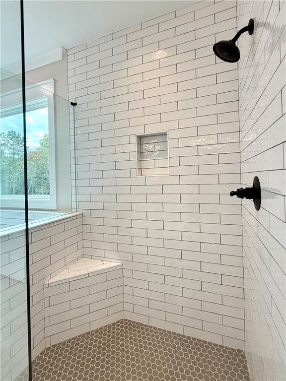 141 Palisade Drive Rydal, GA 30171 - Photo 28 of 50 a bathroom with a shower