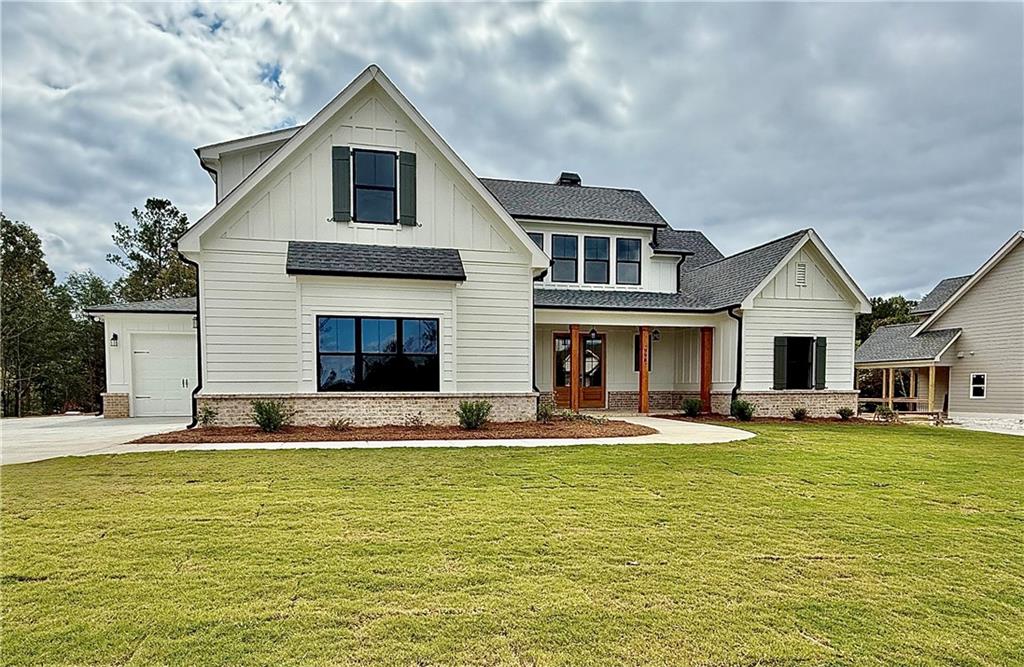 141 Palisade Drive Rydal, GA 30171 - Photo 3 of 50 a house with swimming pool in front of it