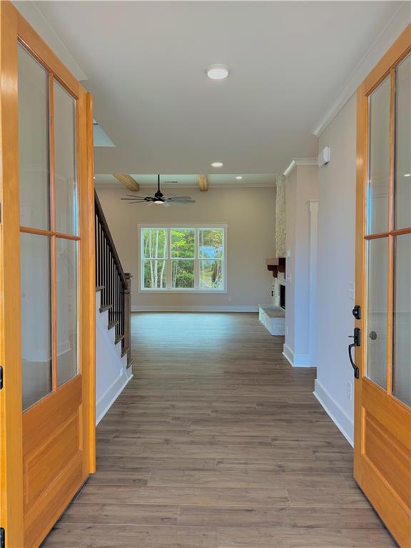 141 Palisade Drive Rydal, GA 30171 - Photo 8 of 50 a view of an entryway with wooden floor and windows