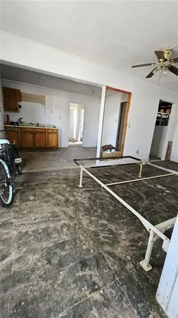 a room with gym equipment and a window