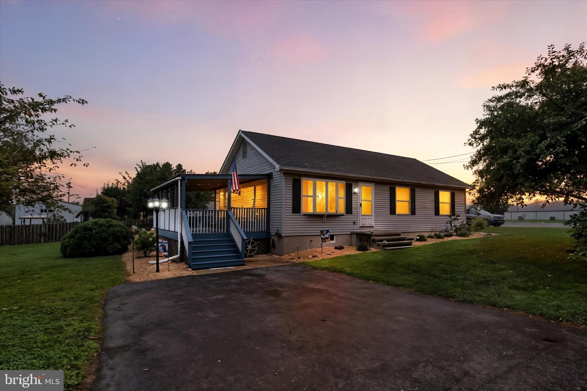 1484 Fire Hall Road Spring Grove, PA 17362 - Photo 1 of 19 a front view of a house with a yard